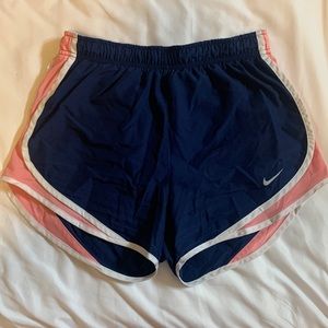Nike Dri-Fit shorts size small. Navy blue and pink